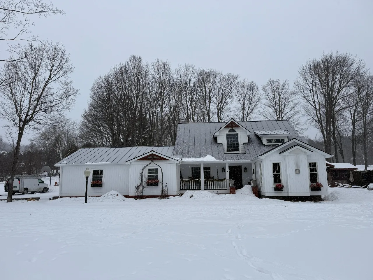 Standing seam metal roof panels installed in Vermont