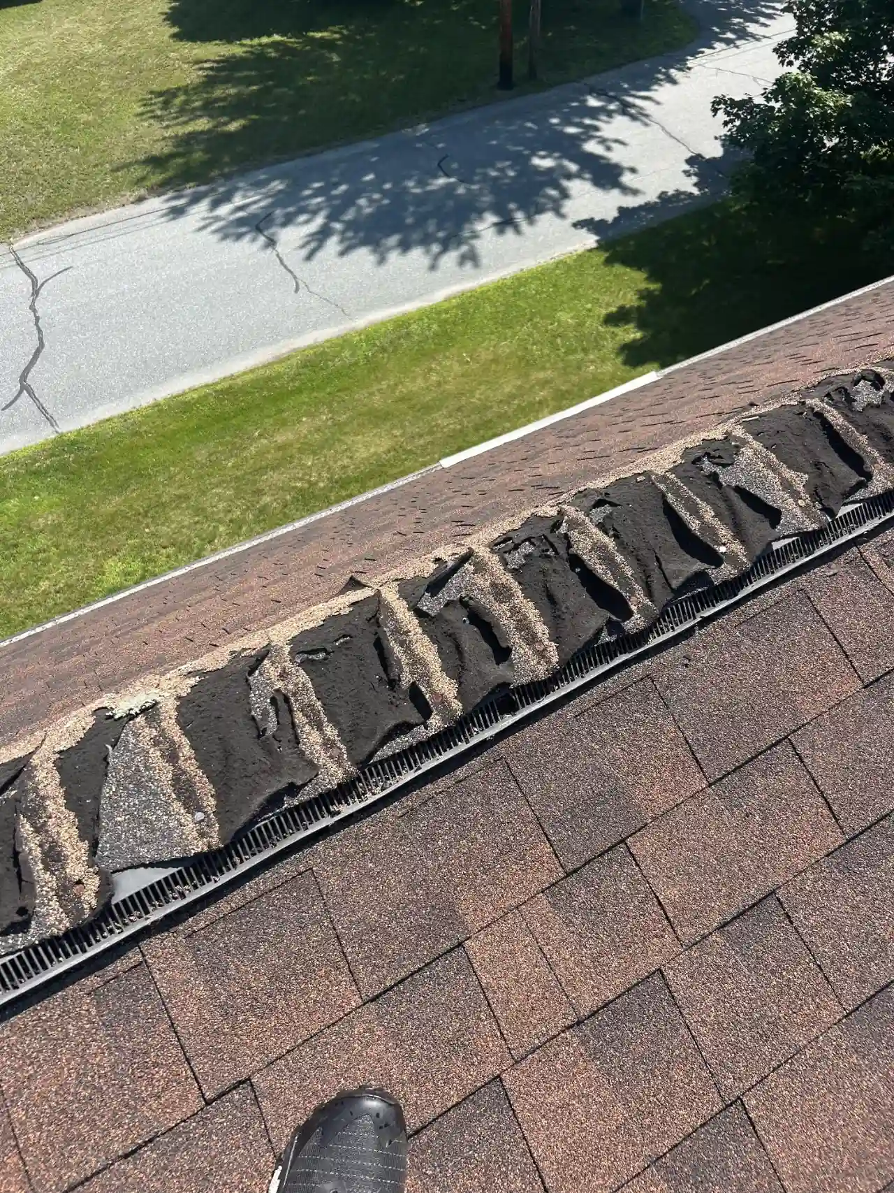 New fascia board installed behind a gutter in Vermont