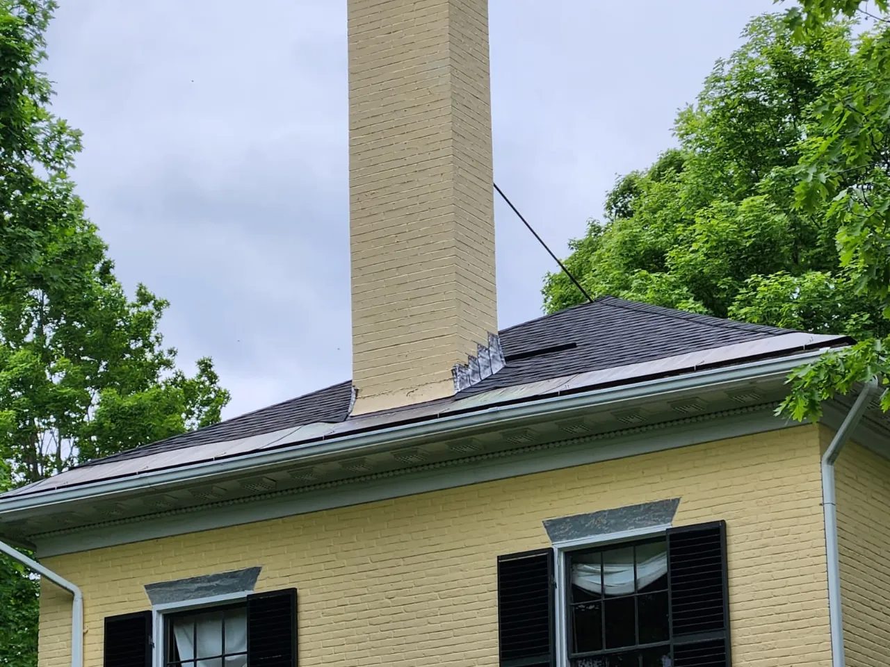 Gutter work on a residential property in Vermont