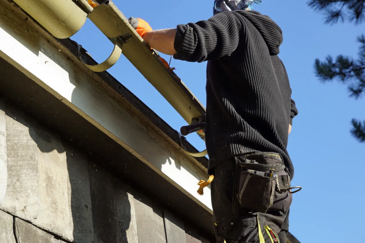 Gutter cleaning on a residential home in Vermont